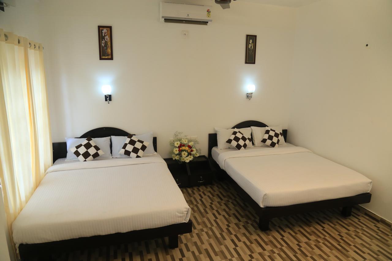 Paithal Resort Kannur Phòng bức ảnh
